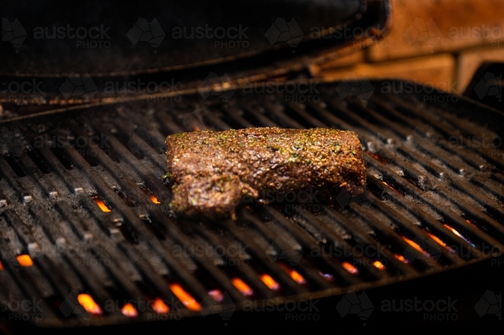 Marinated meat on a BBQ - Australian Stock Image