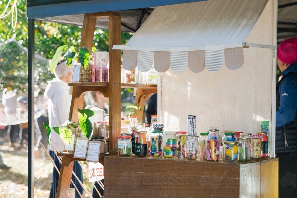 Market stall with objects in jars - Australian Stock Image