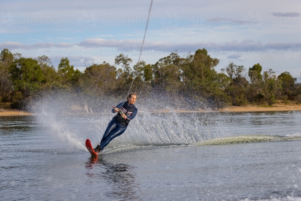 mature woman water-skiing on Lake Towerrinning - Australian Stock Image