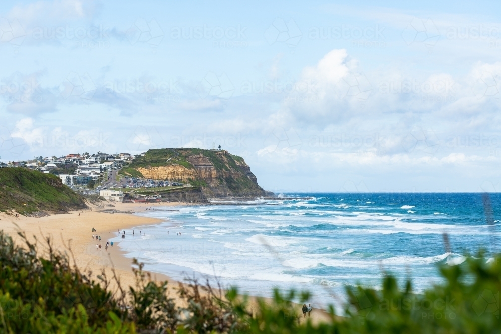 Merewether beach Newcastle with white wash and big sky - Australian Stock Image