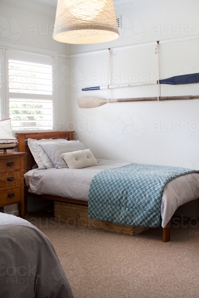 Bedroom through doorway with beach/ coastal interior - Australian Stock Image