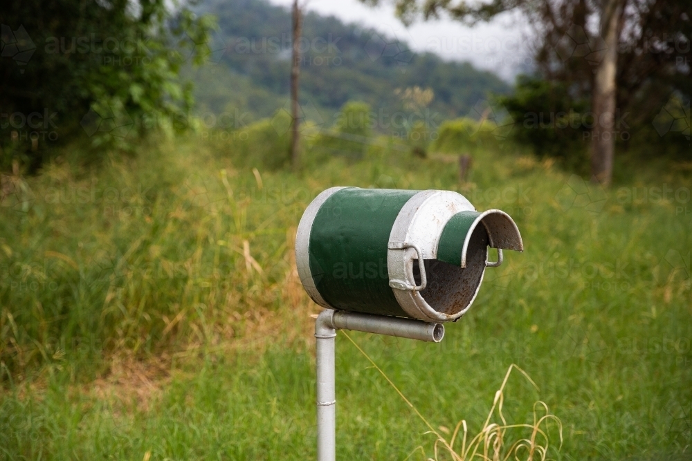 milkcan letterbox in the country - Australian Stock Image