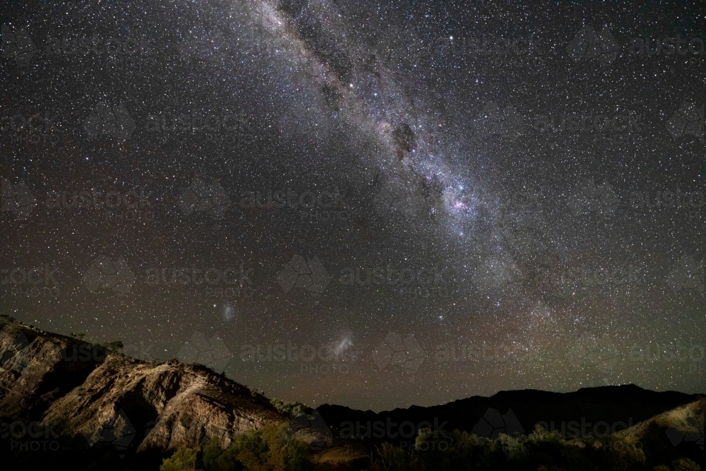 Milky Way over rugged hills - Australian Stock Image