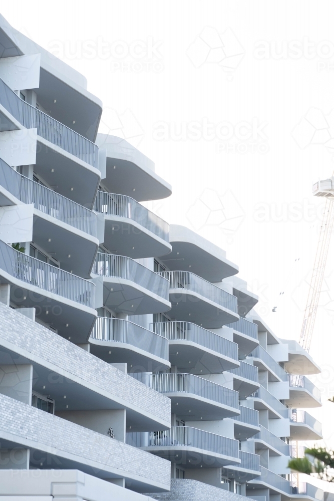 Modern building with multiple levels of balconies - Australian Stock Image