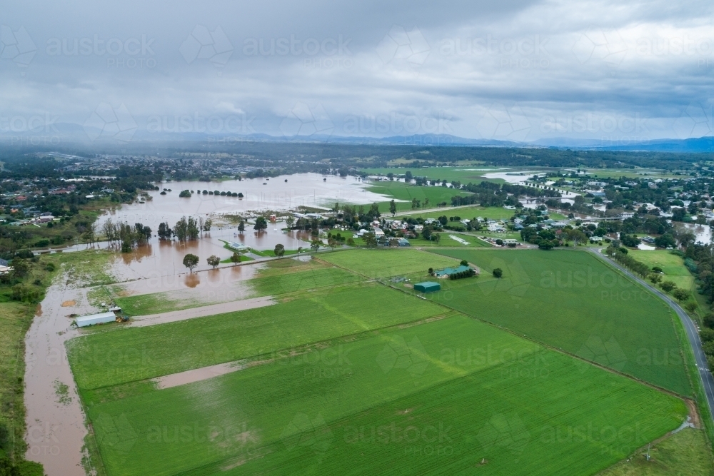 More rain incoming over flooding landscape in NSW, Australia - Australian Stock Image