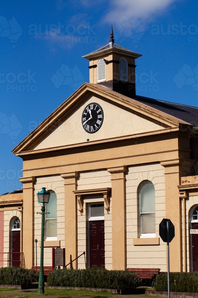 Morpeth Court House now museum with clock on historic architecture - Australian Stock Image