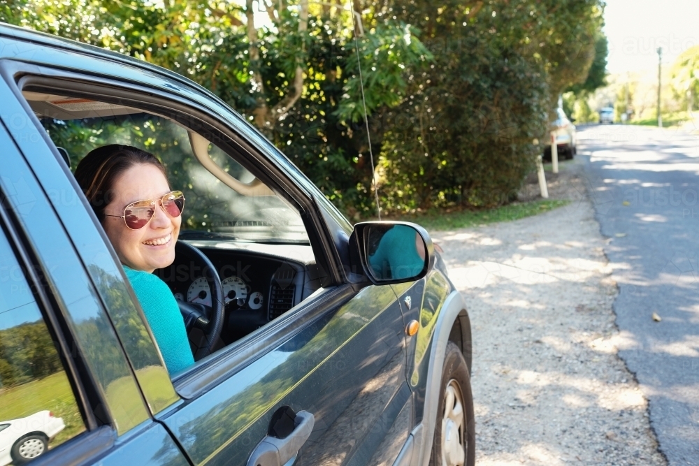 Multicultural  hispanic woman in a car - Australian Stock Image