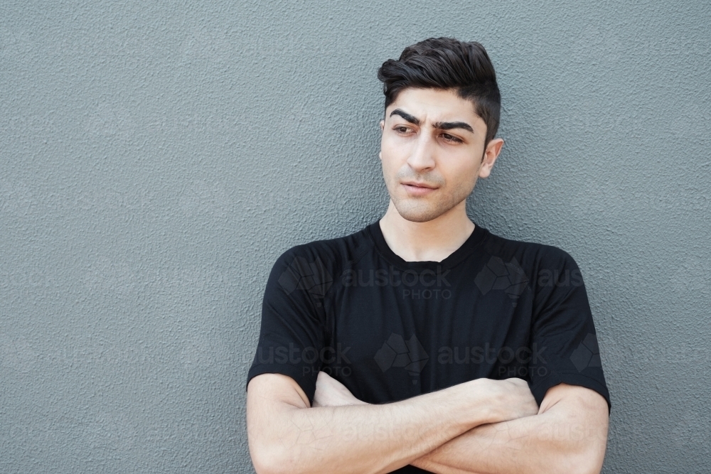 multicultural young adult man, university student - Australian Stock Image