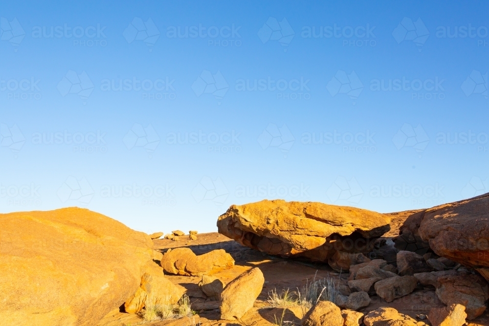 natural rock formation under blue sky - Australian Stock Image