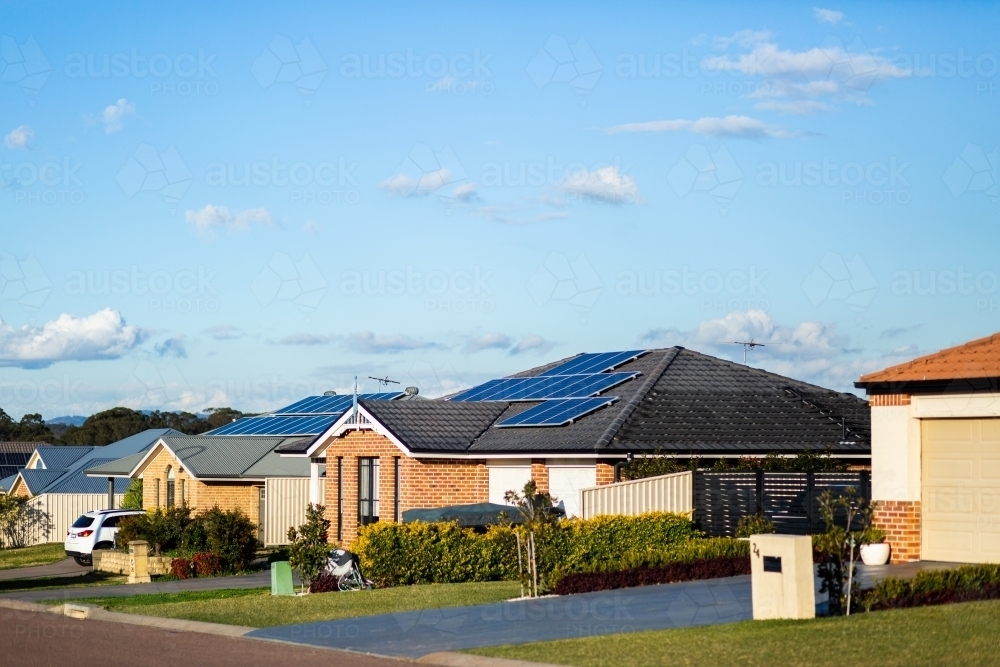 Neat houses along quiet suburban street in town - Australian Stock Image