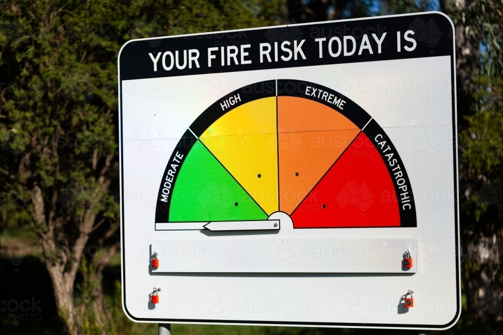 New fire danger rating sign with arrow yet to be assigned in bright sunlight at roadside - Australian Stock Image