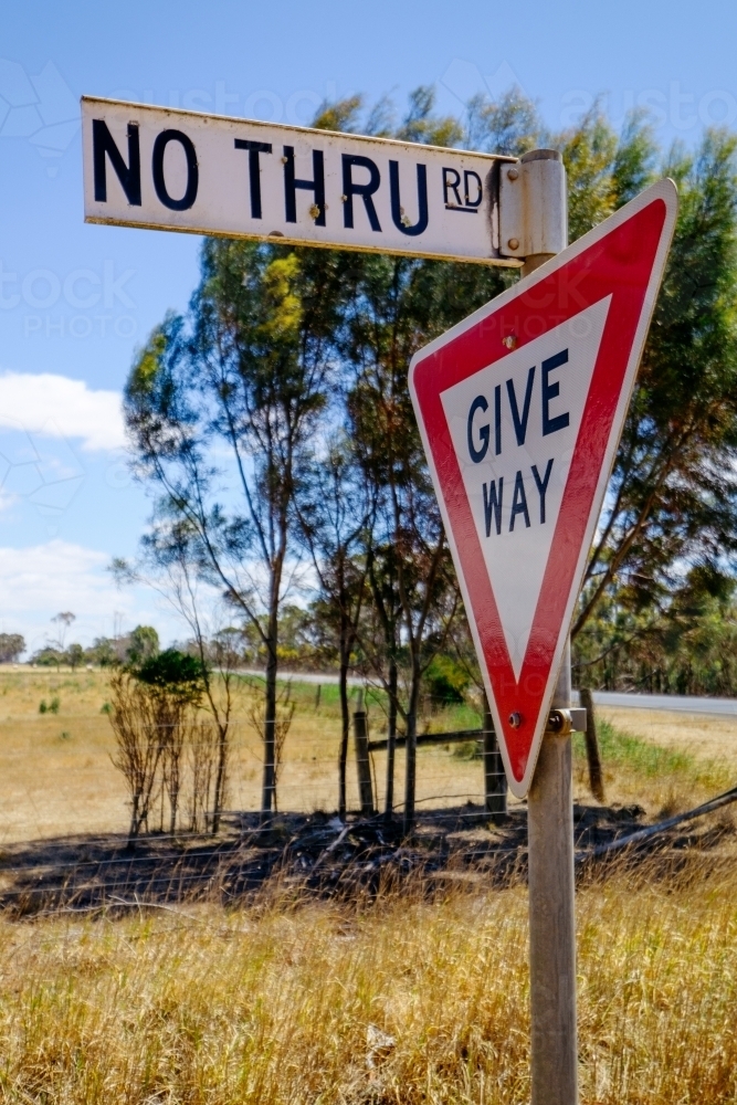 image-of-no-thru-road-and-give-way-sign-on-country-road-austockphoto