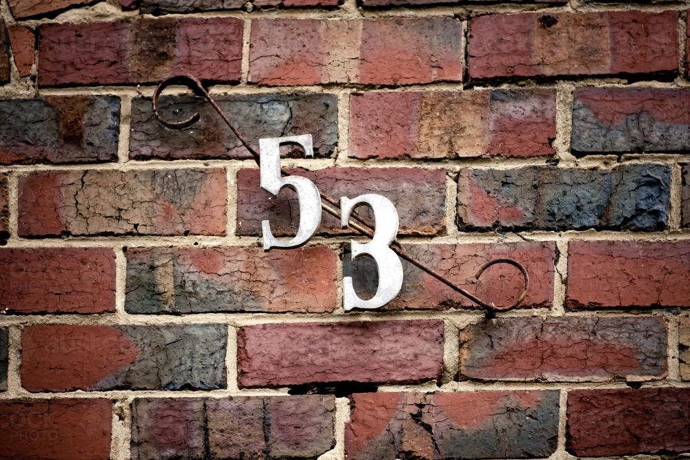 image-of-number-53-on-a-brick-wall-austockphoto