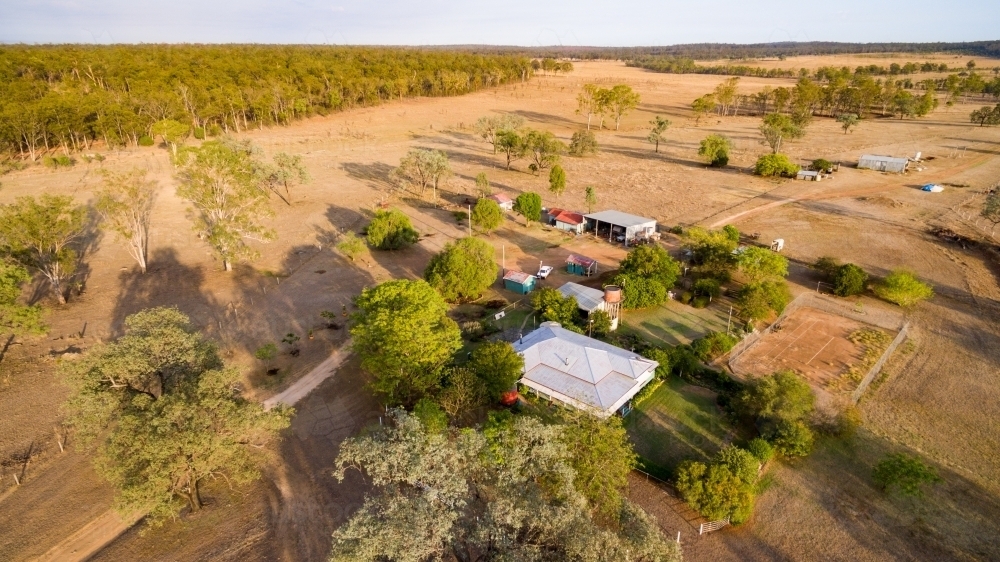 Oblique aerial view of a rural homestead near day's end. - Australian Stock Image