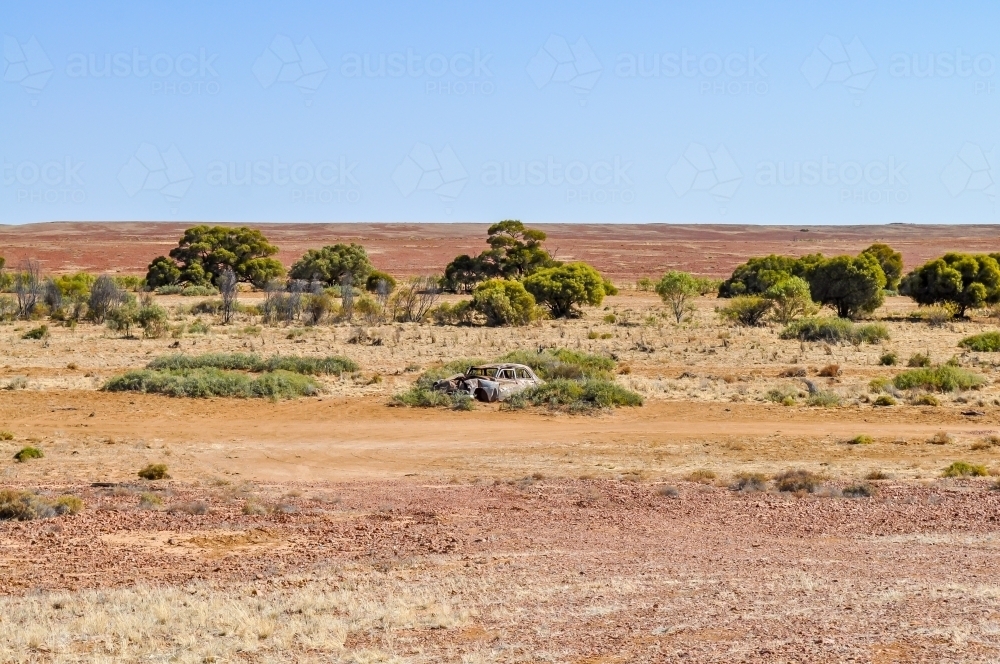 Old car wreck in the desert - Australian Stock Image