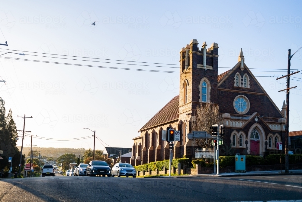 old church building at intersection with traffic lights on Glebe Rd, Adamstown, Newcastle - Australian Stock Image