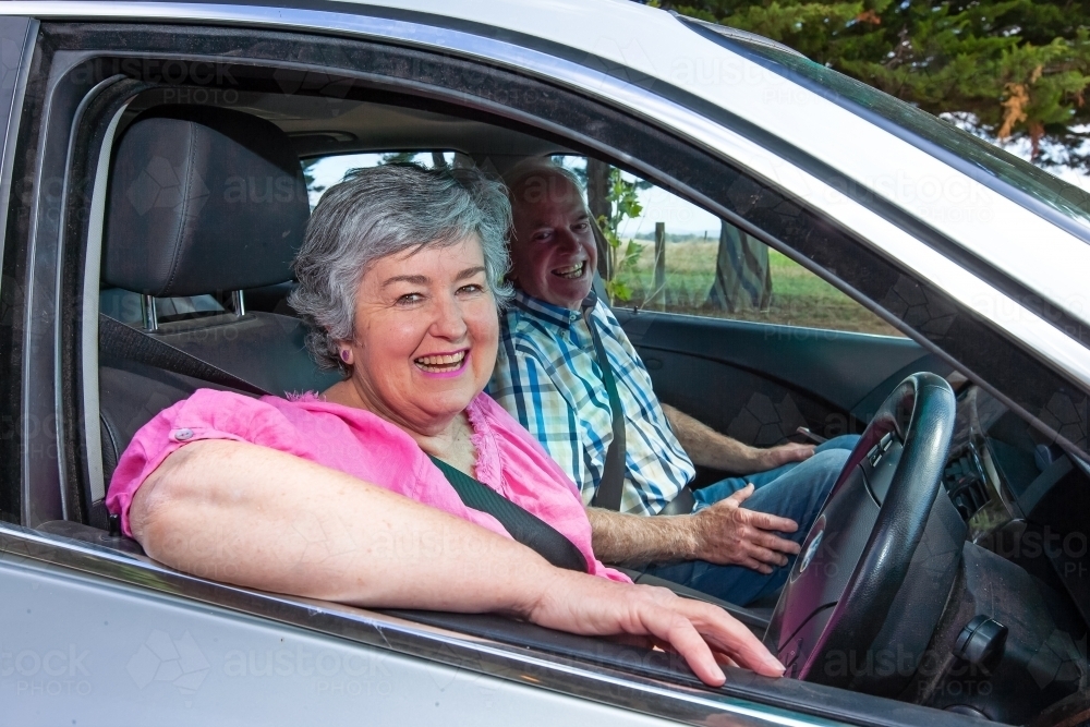 Old couple talking inside their car - Australian Stock Image