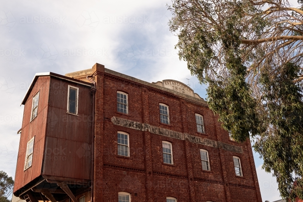 Old flour mill in country town - Australian Stock Image