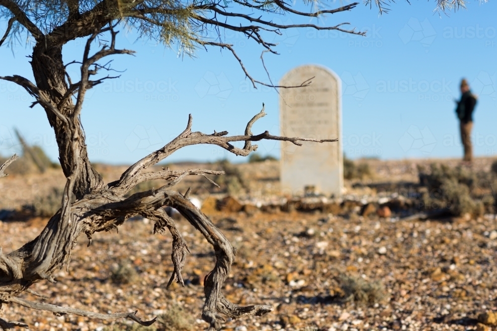 Old headstone in abandoned cemetery - Australian Stock Image