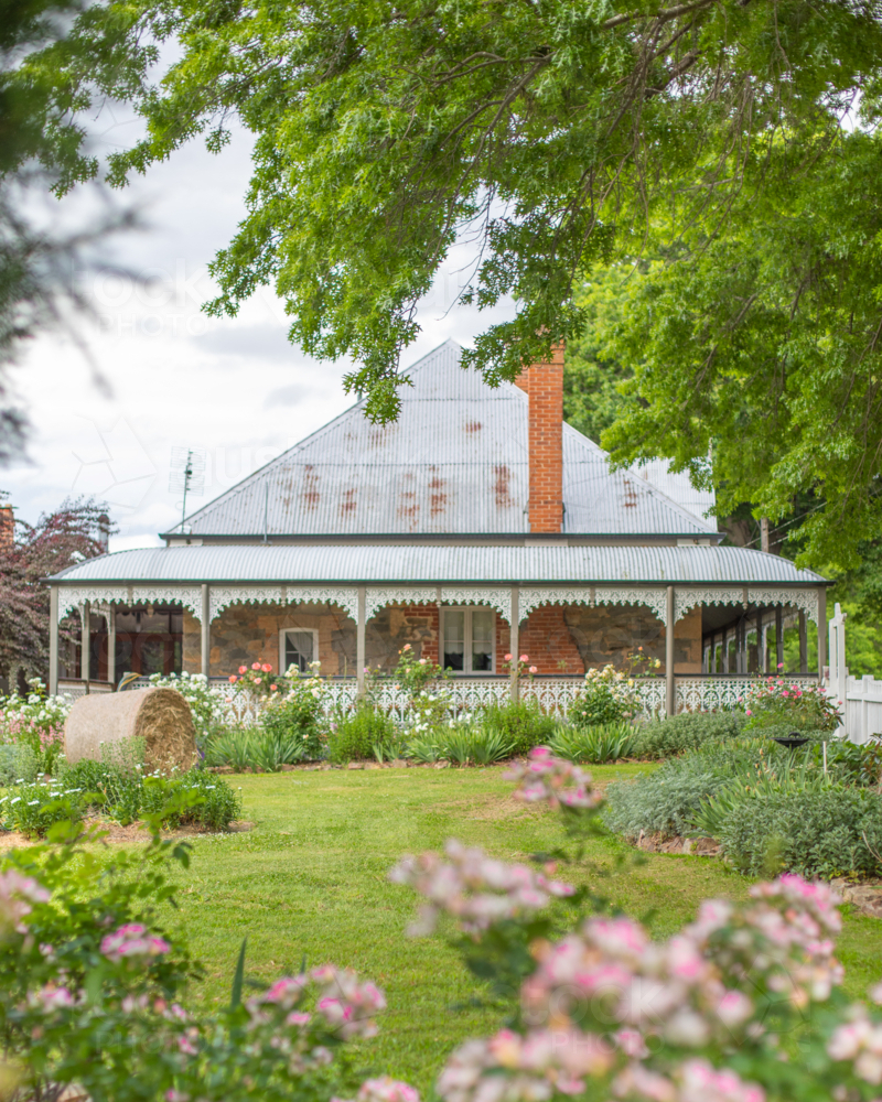 Old historic cottage and country garden - Australian Stock Image