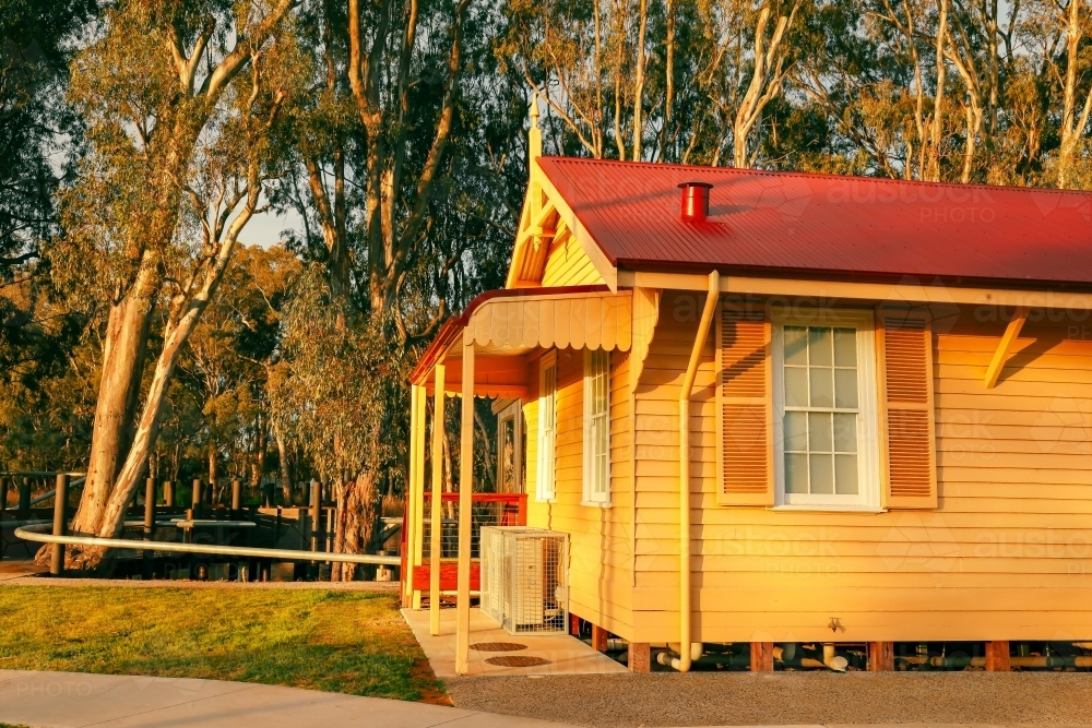 Old railway goods shed at Koondrook after 2021 renovation in golden afternoon sunlight - Australian Stock Image