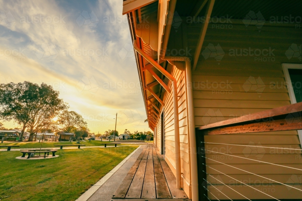 Old railway goods shed at Koondrook in golden afternoon sunlight - Australian Stock Image
