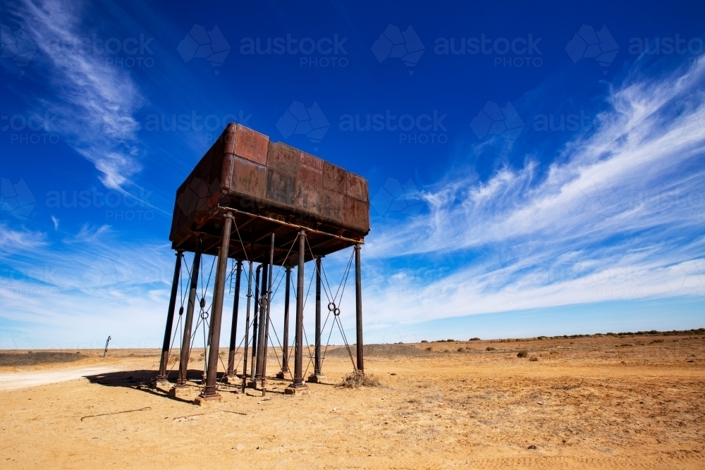 old railway water tank against a blue sky - Australian Stock Image