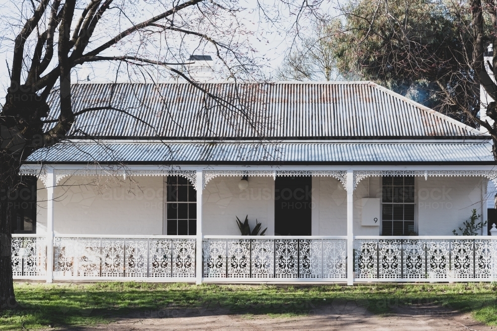 Old rural victorian home with front porch veranda - Australian Stock Image