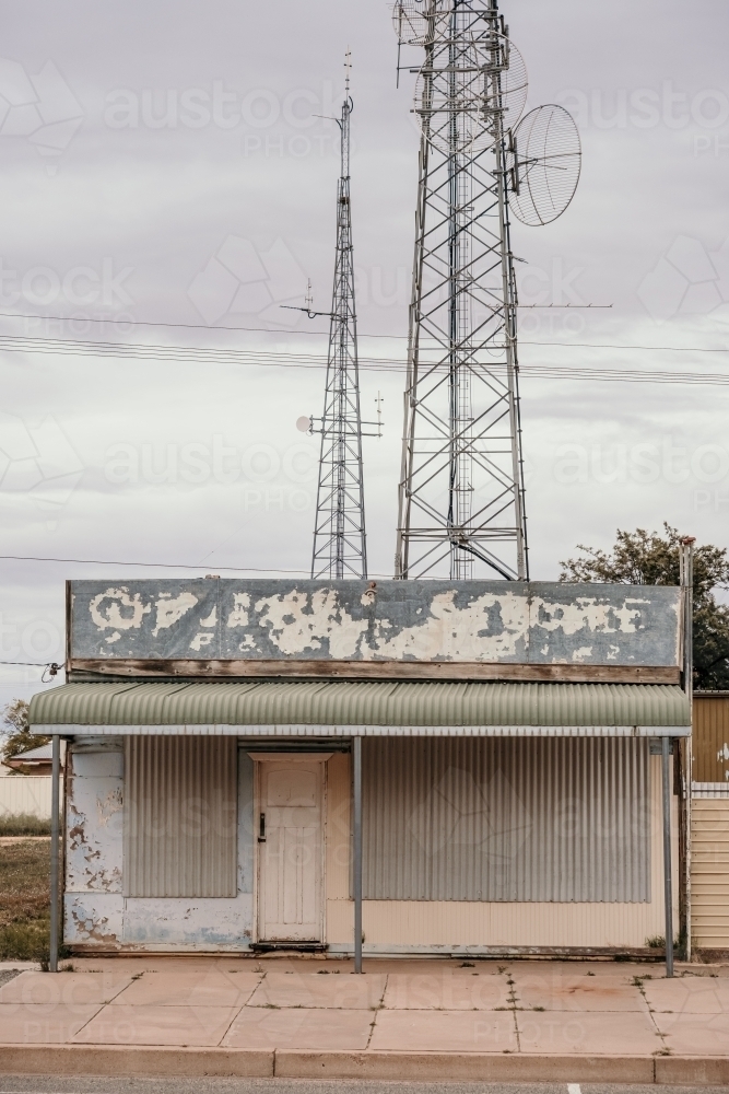 Old shop with telephone towers - Australian Stock Image