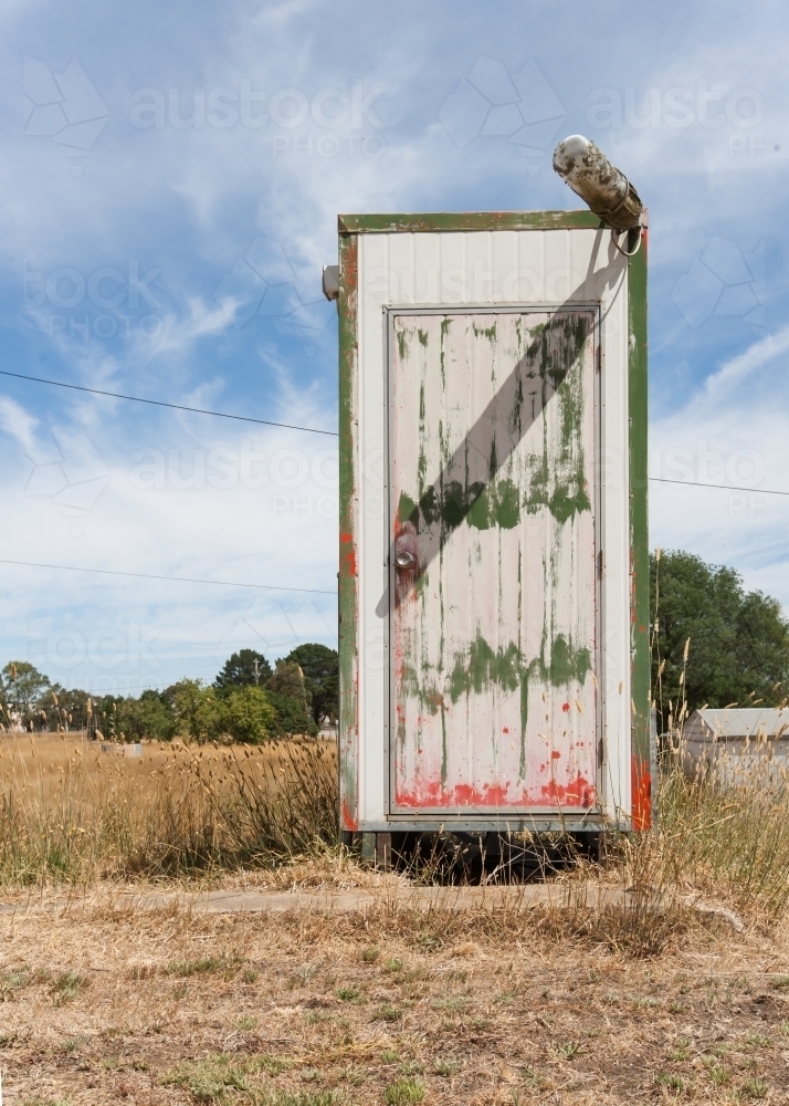 Old toilet at an abandoned petrol station - Australian Stock Image