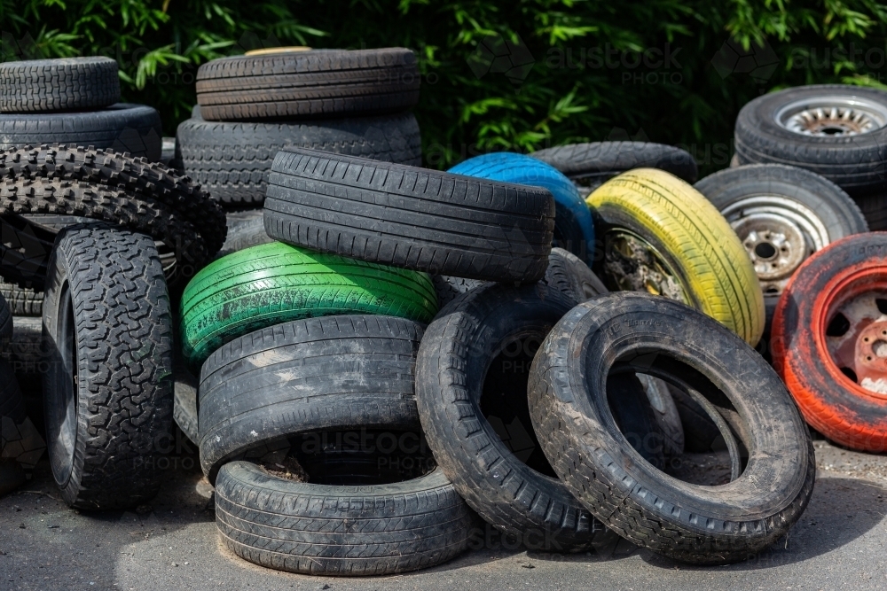 Old tyres in pile at recycling centre - Australian Stock Image