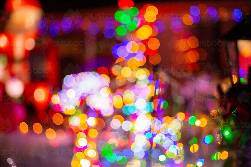 Image of out of focus christmas light display background Austockphoto