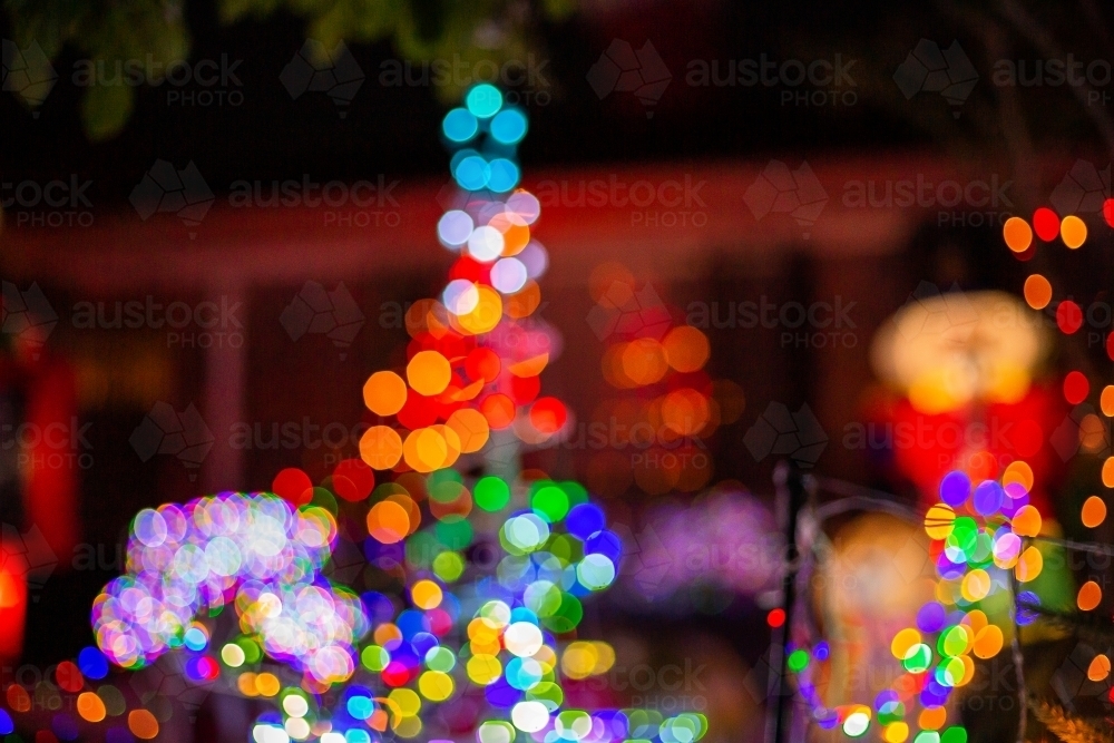 out of focus colourful outdoor christmas lights - Australian Stock Image