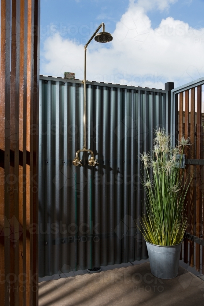 Outdoor shower detail in a new modern house - Australian Stock Image