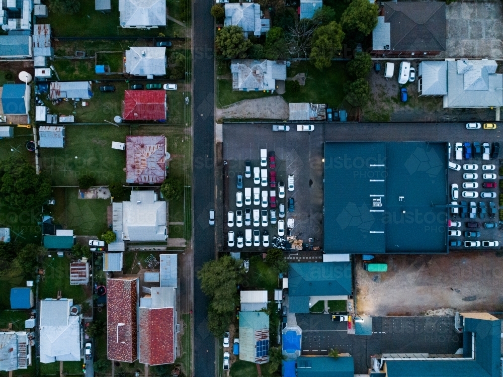 Overhead aerial view of full car lot with parked vehicles - Australian Stock Image