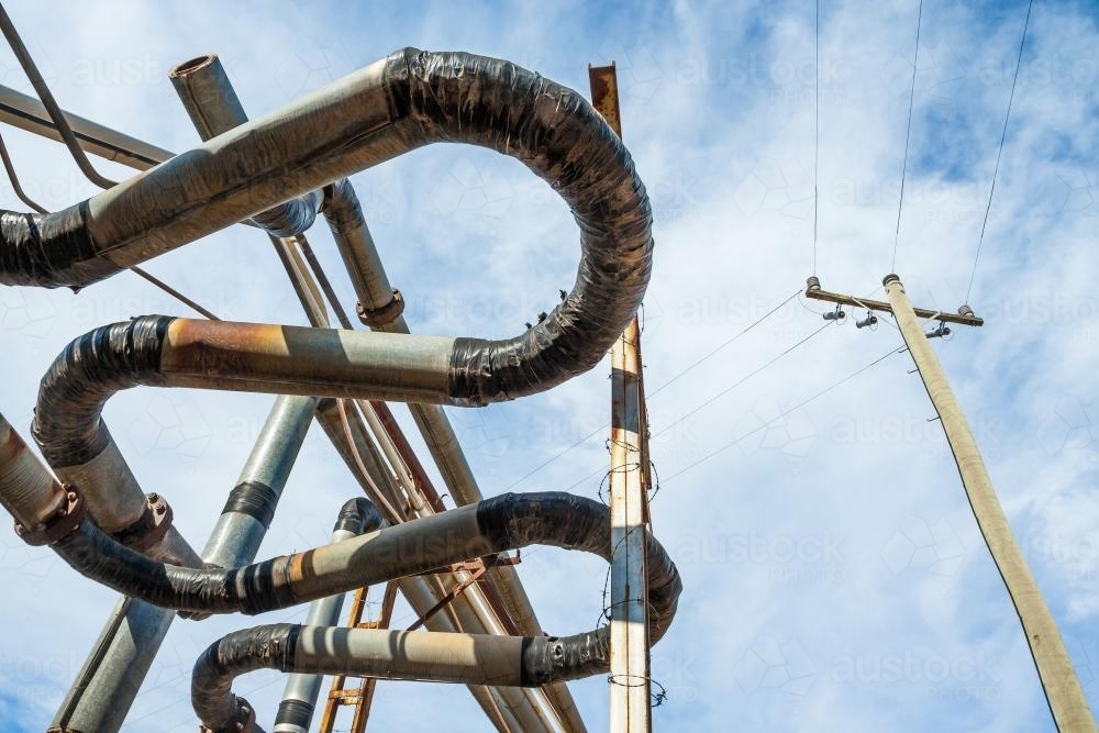 Overhead curved pipes - Australian Stock Image