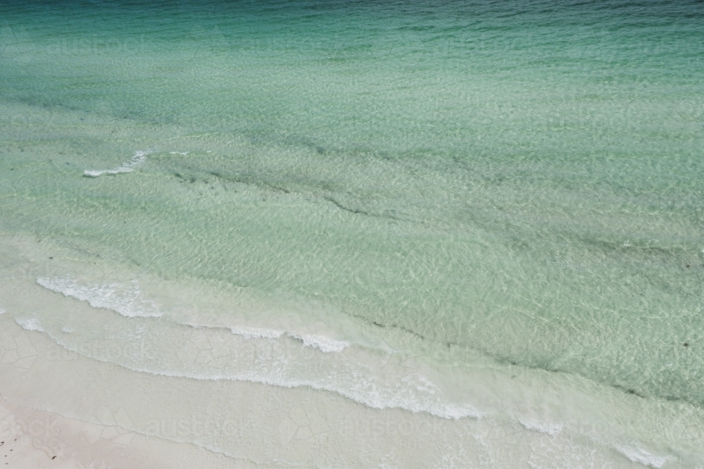 overhead drone image of clear blue water - Australian Stock Image