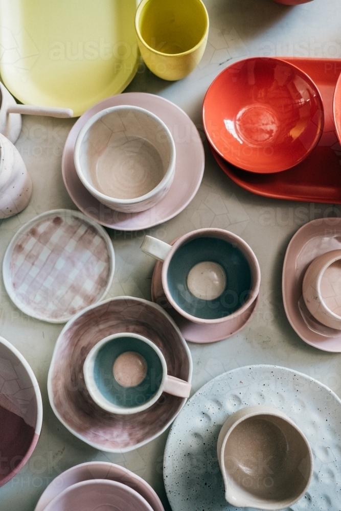 Overhead of plates and cups. - Australian Stock Image