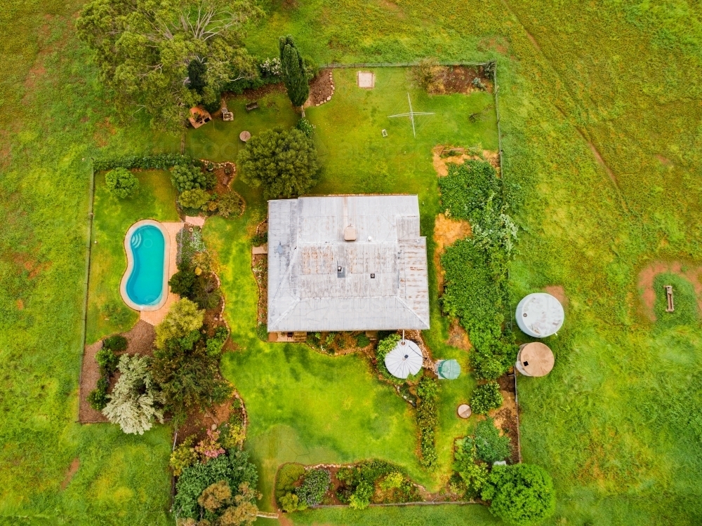 Overhead view of country house on rural farm - Australian Stock Image