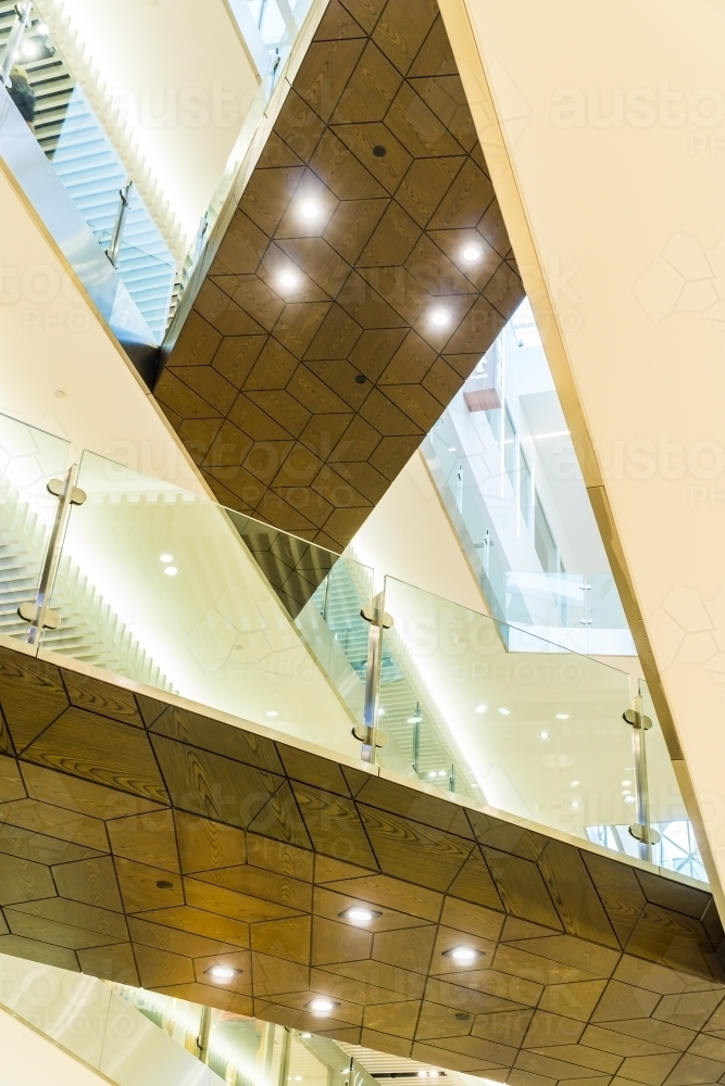 Overhead walkways and lighting in a shopping mall - Australian Stock Image