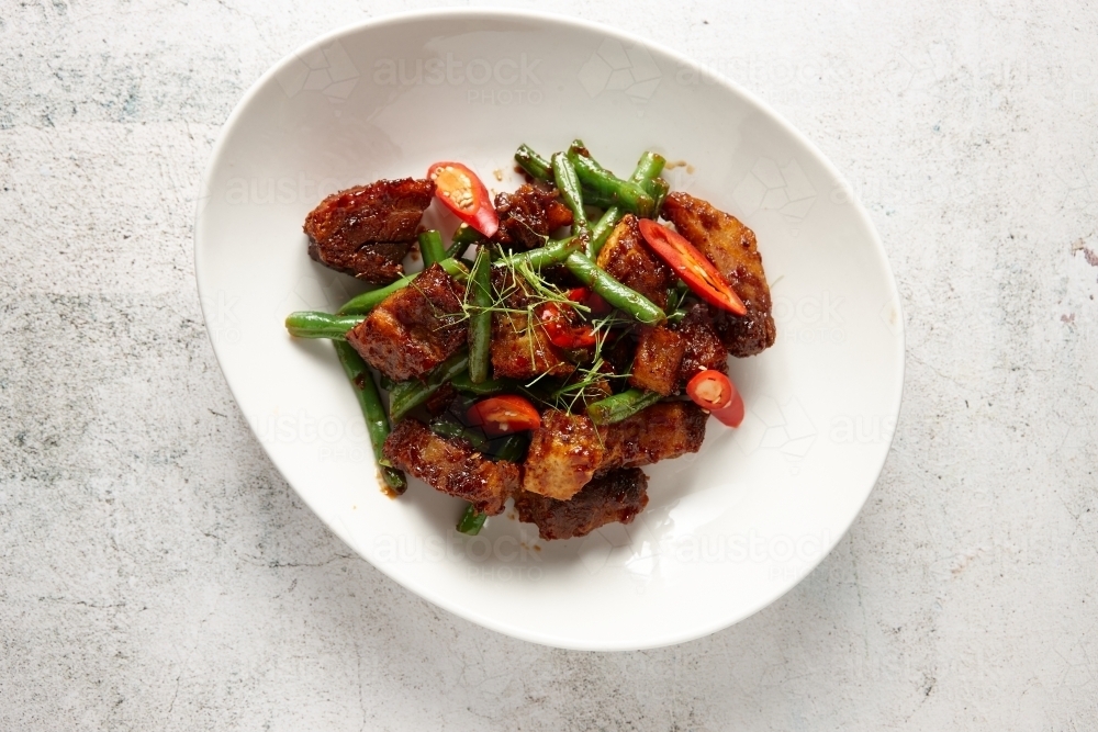 Pad prik khing dish on table - Australian Stock Image