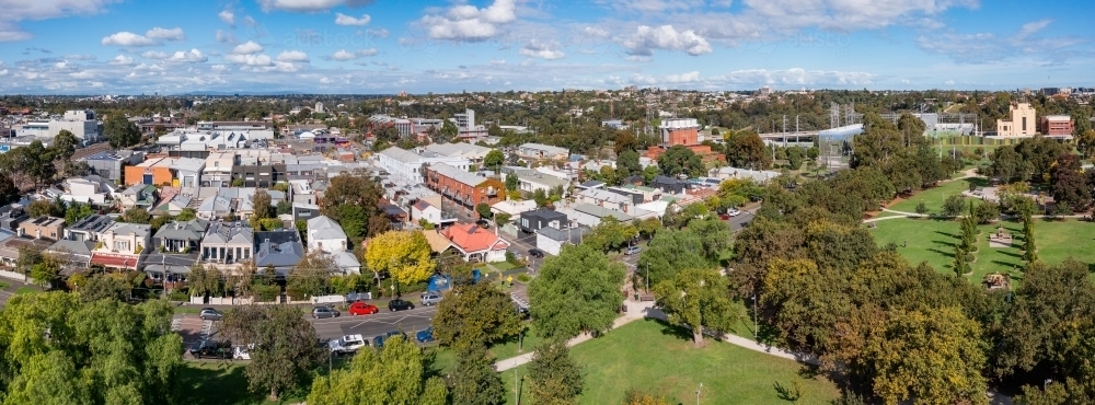 Panorama aerial view of a city park surrounded by residential streets - Australian Stock Image