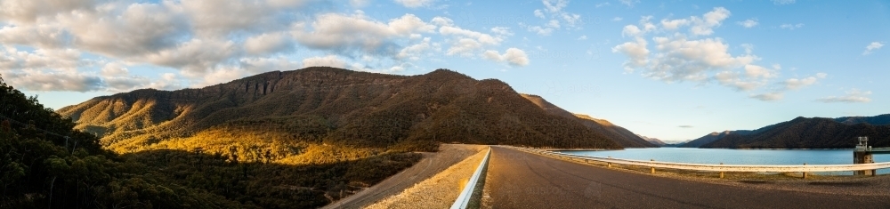 Panorama of Talbingo dam wall and lake with mountain - Australian Stock Image