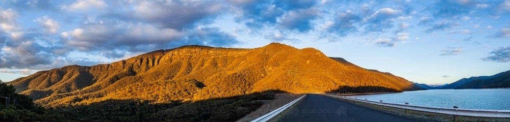 Panorama of Talbingo dam wall and lake with mountain - Australian Stock Image