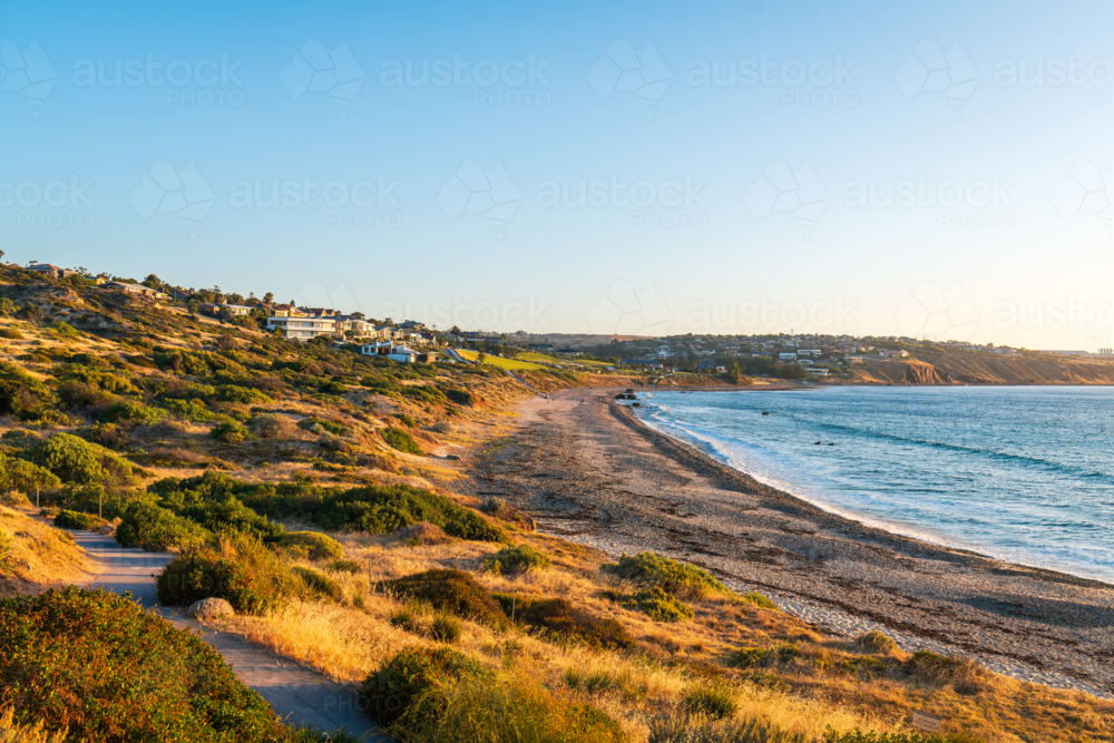 Panoramic view of Hallett Cove beach and houses along the coast at sunset - Australian Stock Image