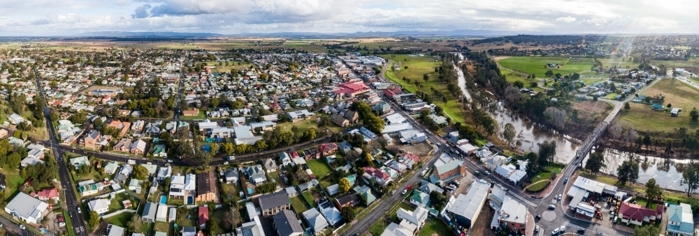 Panoramic view of Singleton town with houses, Hunter River and bridge - Australian Stock Image