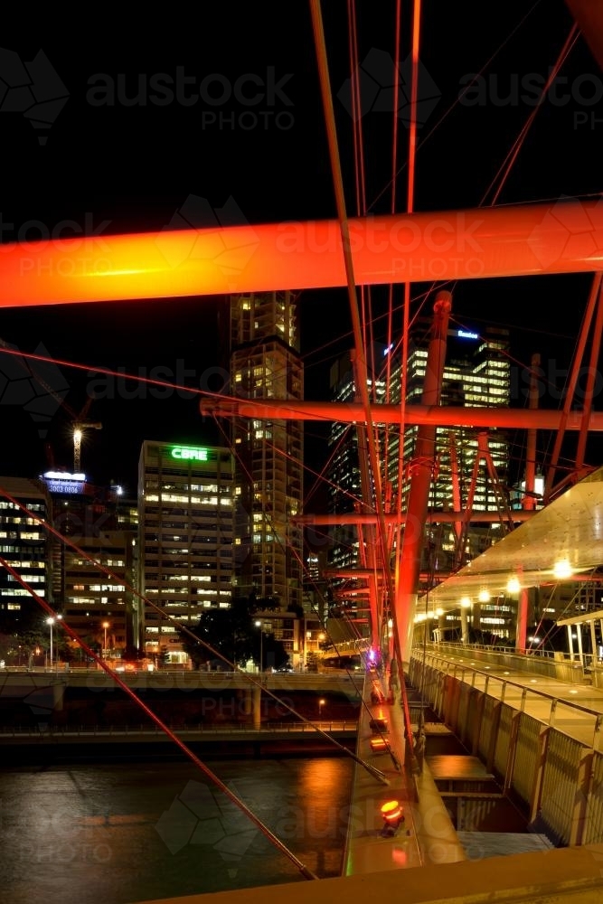 Pedestrian and cyclist bridge lit up in red - Australian Stock Image