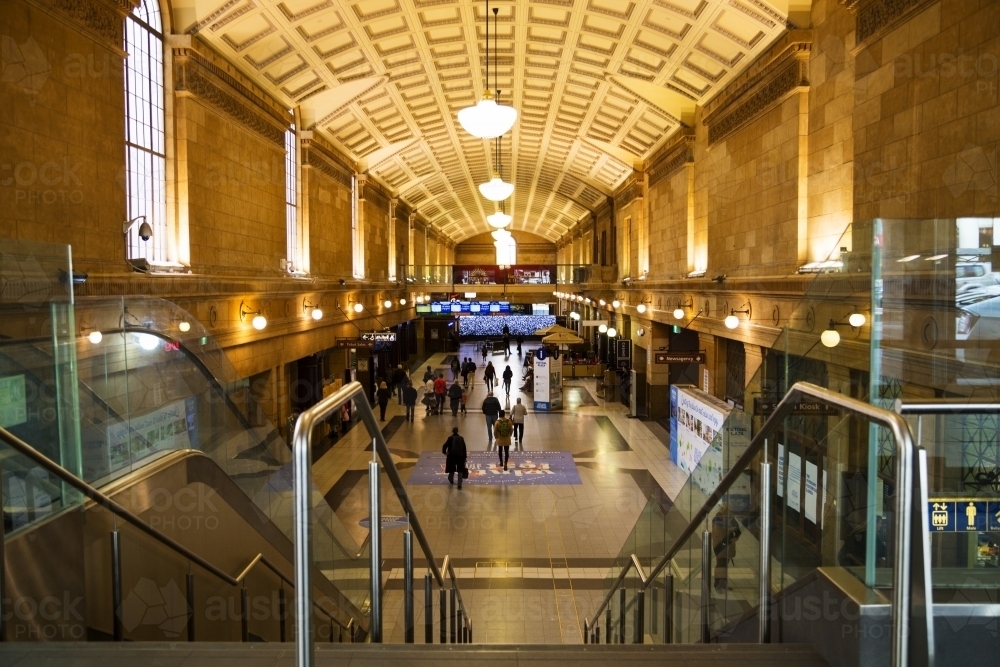 People walking through railway station - horizontal - Australian Stock Image