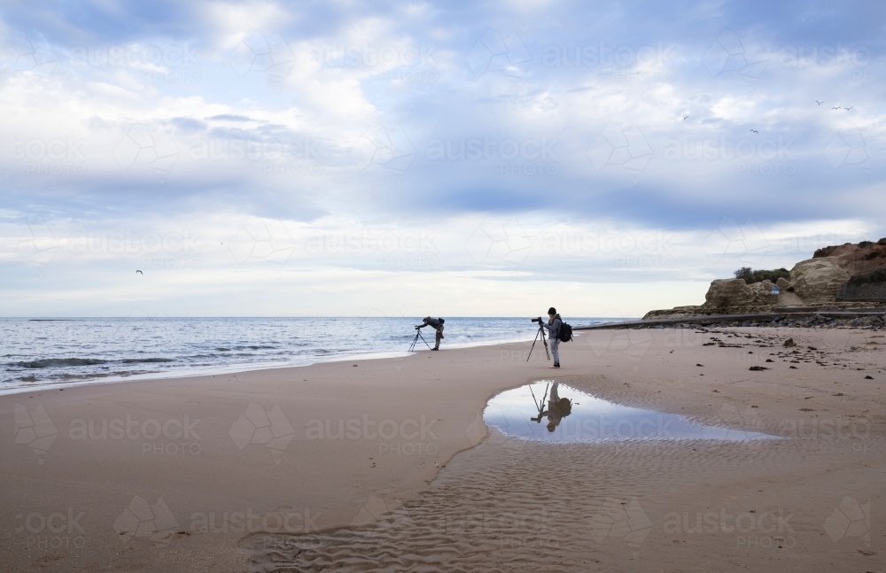 Photographers on a beach - Australian Stock Image