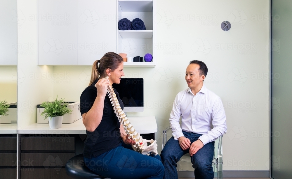 Physiotherapy consultation with patient - Australian Stock Image